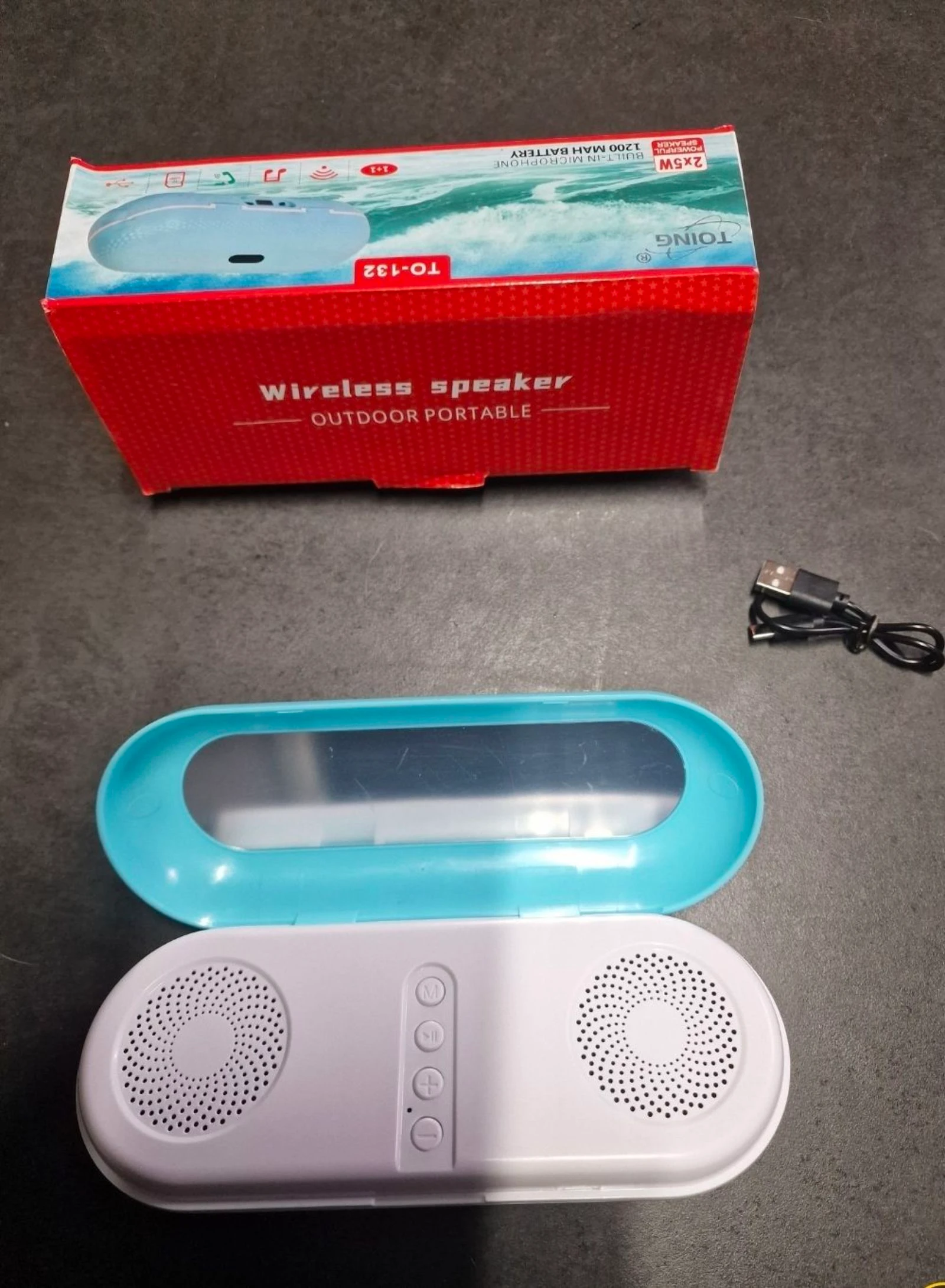 Altifalante Bluetooth portátil Toing TO-132, presentado en una caja azul claro. – photo 3